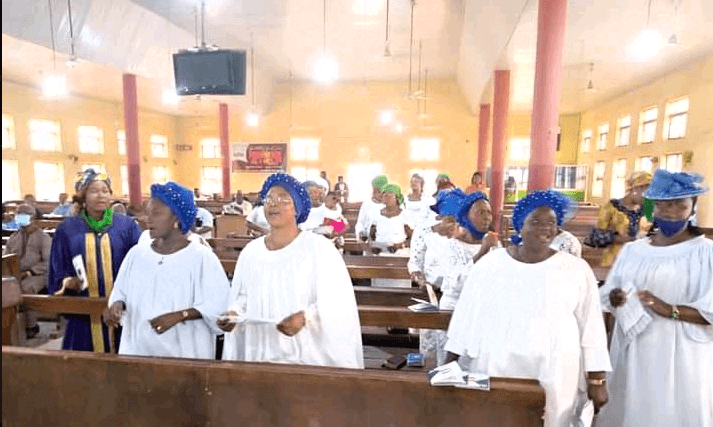 Church members worshipping together